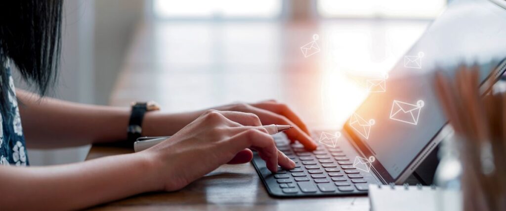 Woman Using Tablet Receiving Email